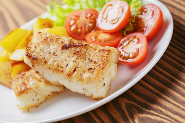 roasted codfish fillet with vegetables