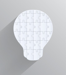 Light bulb with pieces of puzzles, creative design jigsaw with l