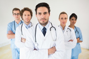 Fototapeta premium Medical team standing arms crossed