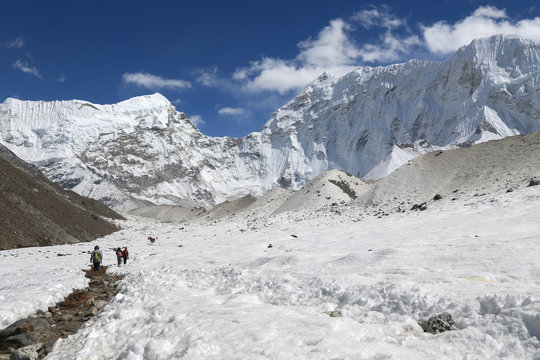 trekker  beside of everest basecamp from everest trek nepal