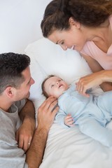 Caring parents with baby boy