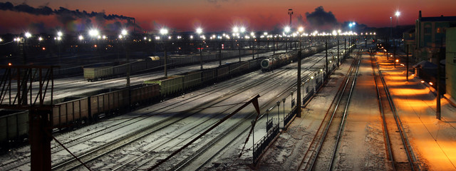 Panorama of railway station at sunrise in winter