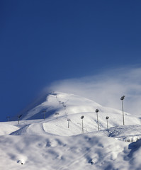Fototapeta premium Ski slope and ropeways in winter