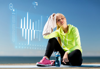 woman resting after doing sports outdoors