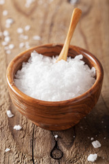 sea salt in wooden bowl and spoon