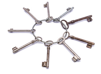 bunch of old antique keys isolated
