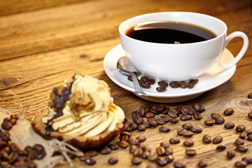 cake and coffee on old wood background