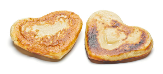 Two heart shape pancakes isolated