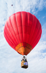 Fototapeta premium Red balloon in the blue sky