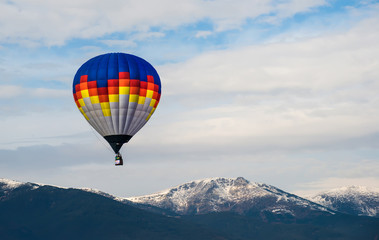 Multicolored Balloon in the blue sky