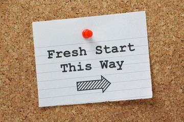Fresh Start This Way Sign on a cork notice board