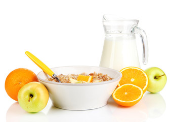 Useful oatmeal in bowl with fruit isolated on white