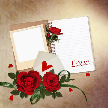 Red roses, notepad, frame on vintage background