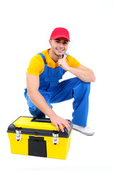 Male worker with toolbox isolated on white