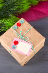 Paper gift box on wooden background