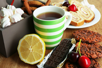 Cup of tea and sweets close up