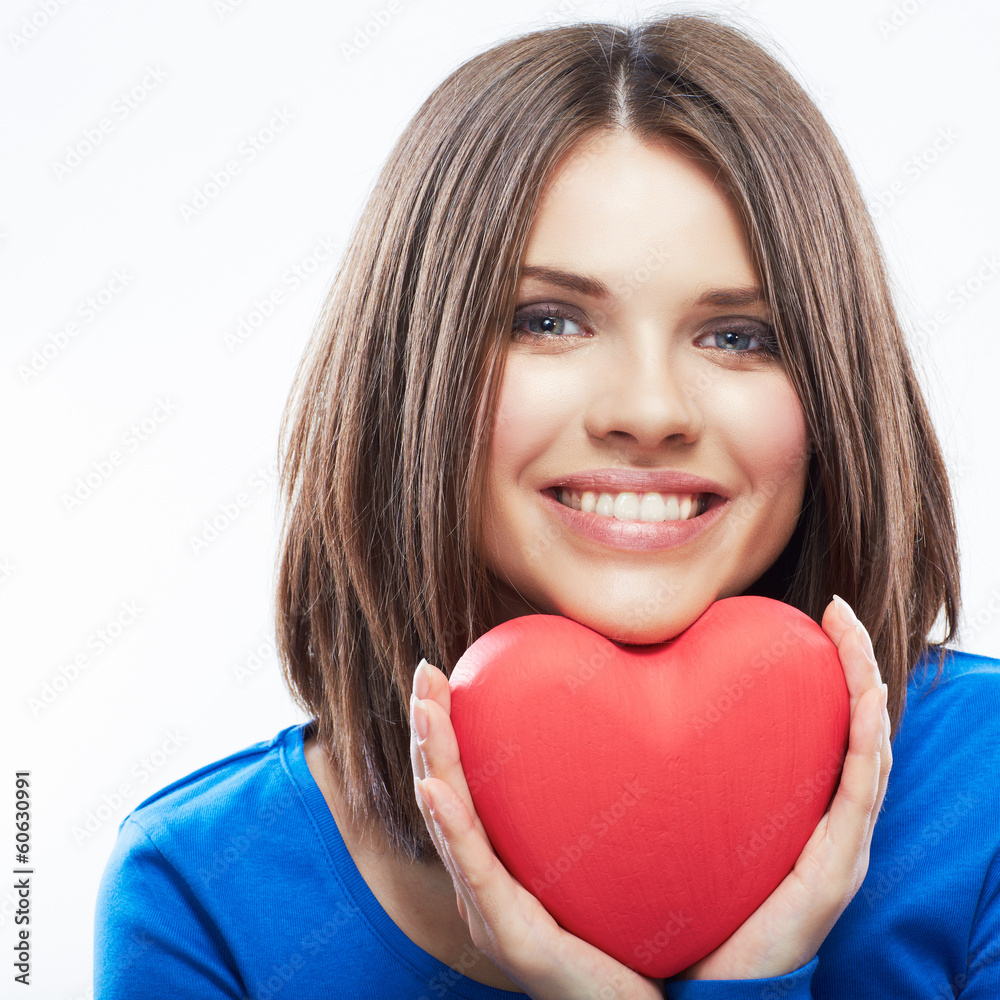 Wall mural smiling young woman hold red heart, valentine day symbol. girl