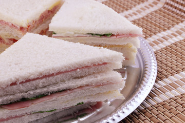 Sandwiches on a silver tray