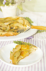 Piece of pear pie on summer table