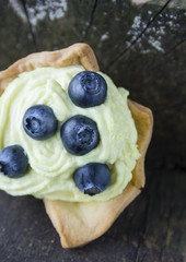 Bilberry and Goat's Cheese Tart on old wood