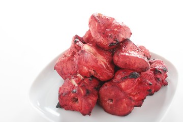 Indian Chicken Tikka kebab isolated on white