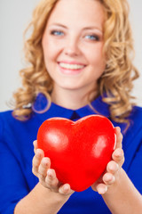 woman holding heart