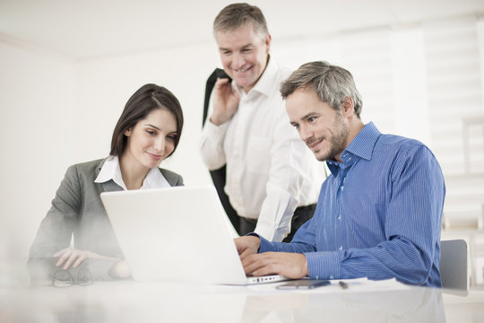 manager and his workteam at office