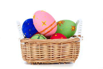 Fototapeta na wymiar Eggs in basket on white c