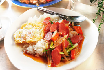 Breakfast fried rice with hot dog, fried egg