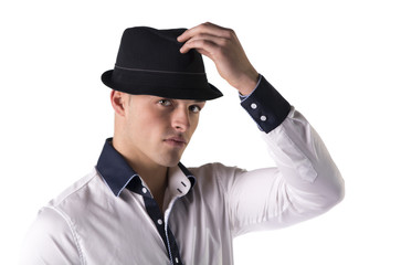 Attractive young man with fedora and white shirt