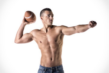 Handsome, young man shirtless, throwing american football ball