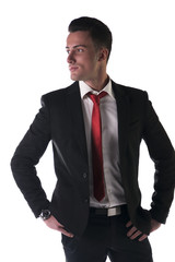 Attractive, serious young businessman with jacket and tie