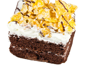 Frosted chocolate brownie on white background . Macro with extre