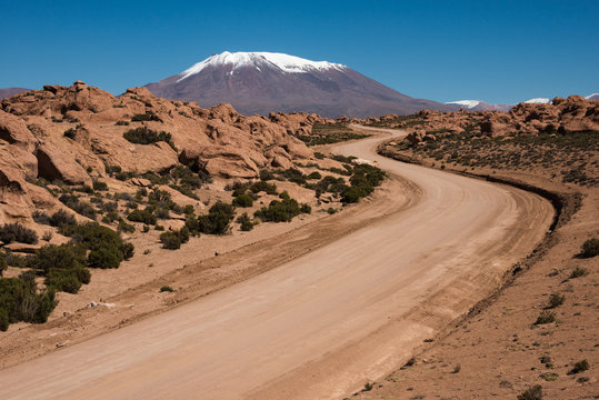 Sandy curve road to the mountain, Bolivia