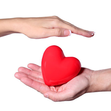 Valentine Heart in Female and Male Hands, isolated