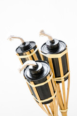 Isolated. torches lamp made ​​of cans for fuel.