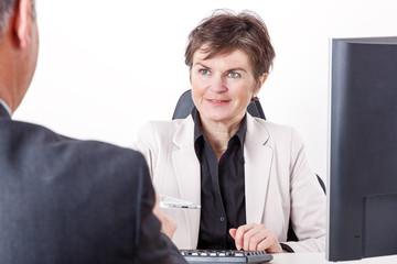Boss talking to candidates