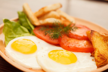 fried eggs with vegetables