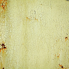 Detail of cracked paint on wall.