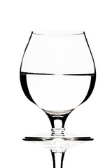 glass of water on a black