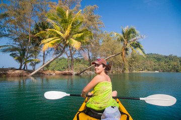 Young girl in a sea kayak