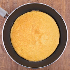 omelette in frying pan