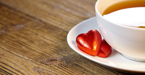 Cup of tea with lemon on the wooden table
