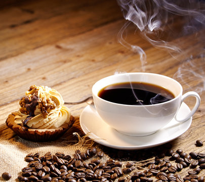 cake and coffee on old wood background