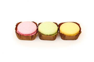 Colorful three macaroons isolated on white background
