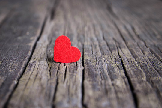Red heart on wooden background, Valentines Day.
