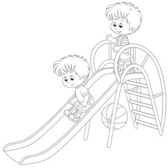 Little boys on a slide
