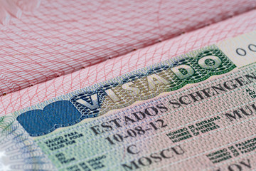 Fototapeta premium shot of few passport with Schengen visa