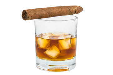 Glass of whiskey with ice and cigar