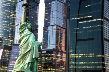 Fototapeta premium New York Statue of Liberty against city skyscrapers